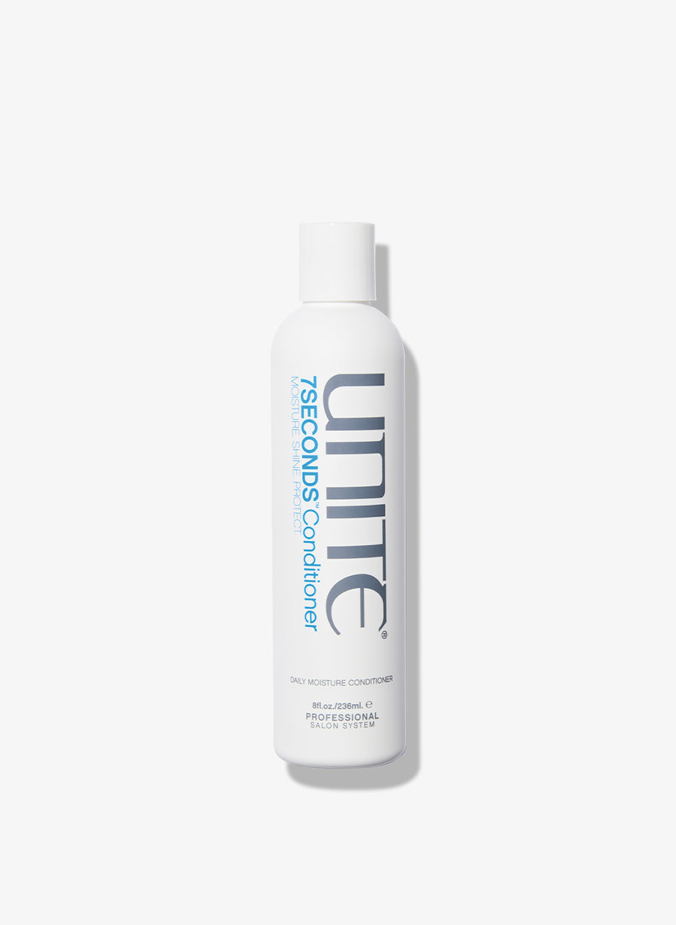 White bottle of UNITE Hair 7SECONDS conditioner.